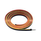 Flexible black LED strip light with warm white and red colors for decorative lighting effects