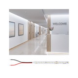 LED strip light with white LEDs and connection wires, suitable for modern room and accent lighting solutions