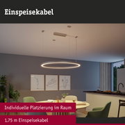 Moderne runde LED-Hängeleuchte in warmweiß mit 1,75 m Einspeisekabel in Wohnraum mit Essbereich