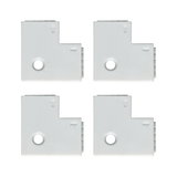 Quatre connecteurs d'angle en plastique blanc avec flèches et trou pour éclairage LED sur rail.