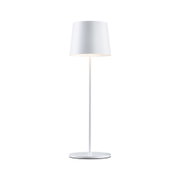 White metal floor lamp with round base and simple lampshade for modern interior lighting