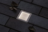 Square stainless steel recessed LED light with warm white glow in dark outdoor paving for garden lighting