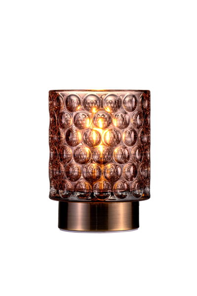 Table lamp with brown textured glass and bronze metal base for ambient lighting in living spaces