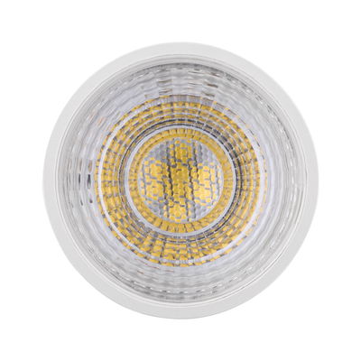 Round spotlight with white housing and yellow LED chips, energy-efficient LED lighting.