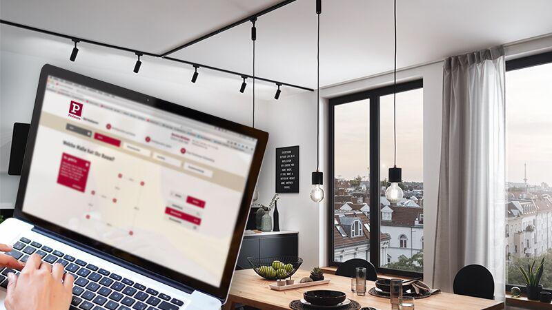 Éclairage sur rail Urail noir moderne avec suspensions dans salle à manger lumineuse vue sur la ville