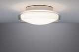 Plafonnier discret en verre blanc avec bord transparent pour un éclairage moderne.
