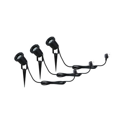 Three black LED garden spotlights with ground spikes and cables for outdoor garden lighting.