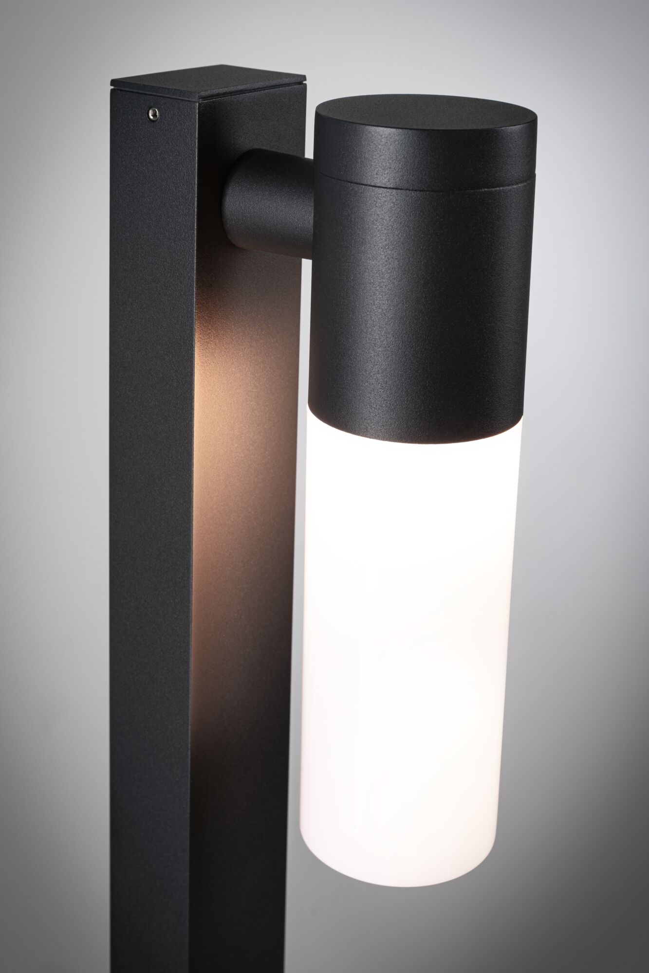 Modern outdoor wall light in matte black metal with white glass for garden lighting