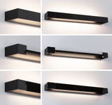 Modern black metal LED wall light with warm white illumination for stylish indoor lighting