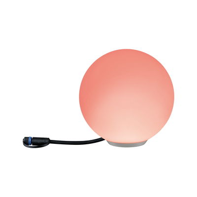 Round LED lamp with orange glass and black cable for ambient lighting in modern interiors