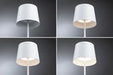 Quatre vues d'une lampe sur pied blanche en métal avec abat-jour simple pour éclairage intérieur