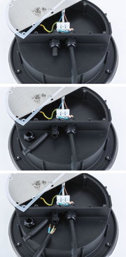Black plastic housing with electrical cable connections and screws for LED lighting installation