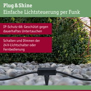 Schwarzes Plug & Shine Kabel mit IP68 Schutz vor dauerhaftem Untertauchen im Gartenbereich