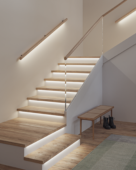 Modern wooden staircase with integrated LED step lighting and glass railing for safe stairway illumination