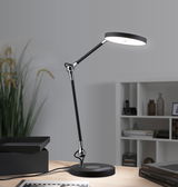 Moderne sort LED-skrivebordslampe med rund lyskilde og touchpanel til kontorbelysning