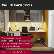 Modern office setup with grey wall cabinets and yellow wall lighting ideal for home office workspace