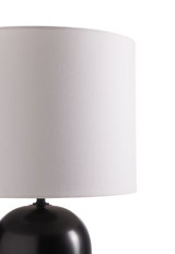 Modern table lamp with black metal base and white fabric shade for stylish home lighting
