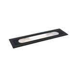 Black metal recessed light with elongated glass window for modern indoor lighting