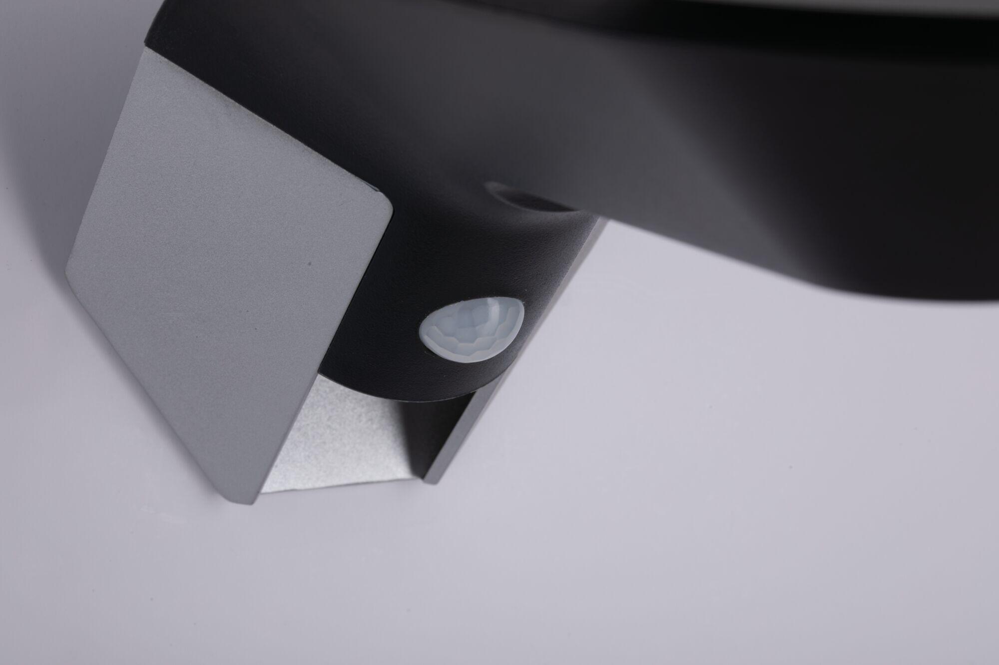 Close-up of black and silver sensor with hexagonal pattern for lighting technology