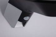 Close-up of black and silver sensor with hexagonal pattern for lighting technology