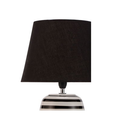 Modern table lamp with black fabric shade and striped black-white ceramic base for stylish home lighting