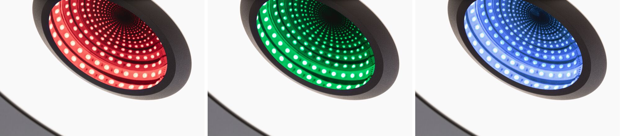 Drei LED-Einbaustrahler mit schwarzem Rahmen in Rot, Grün und Blau für moderne Lichtakzente.