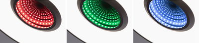 Drei LED-Einbaustrahler mit schwarzem Rahmen in Rot, Grün und Blau für moderne Lichtakzente.
