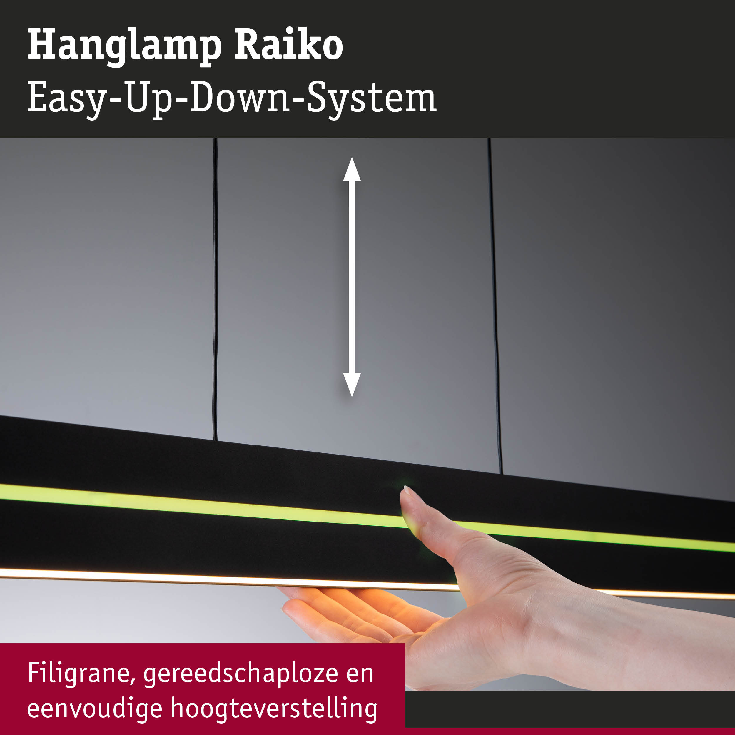 Hand stelt zwarte Raiko LED-hanglamp in met Easy-Up-Down-systeem en eenvoudige hoogteverstelling