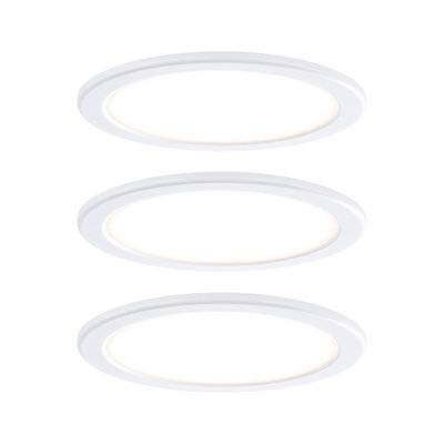 Three white round LED recessed lights with warm white light for modern room lighting