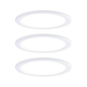 Three white round LED recessed lights with warm white light for modern room lighting