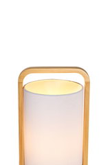 Modern floor lamp with light fabric shade and natural wood frame for cozy living spaces