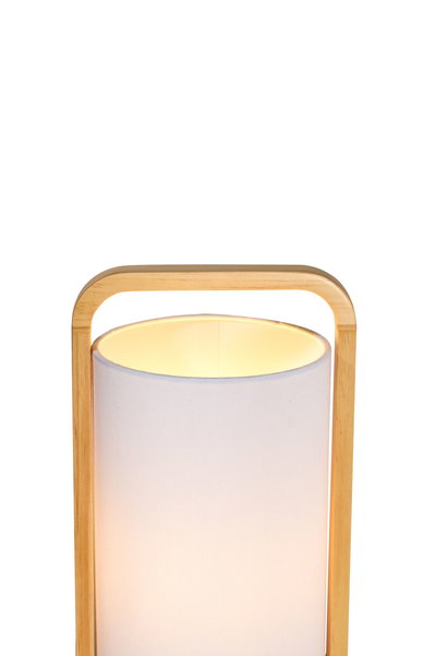 Modern floor lamp with light fabric shade and natural wood frame for cozy living spaces