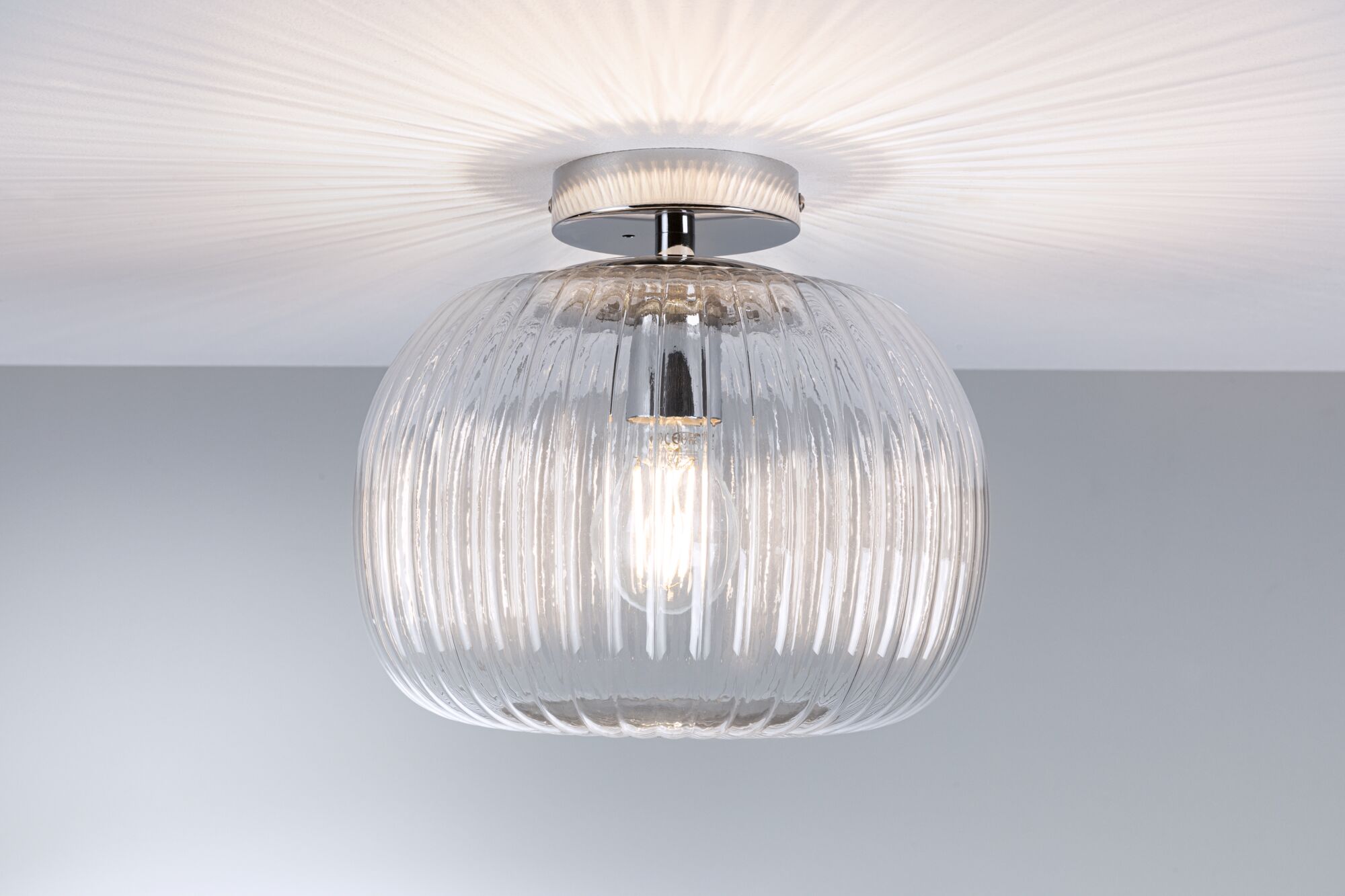 Ceiling light with ribbed clear glass and chrome mount for modern home lighting