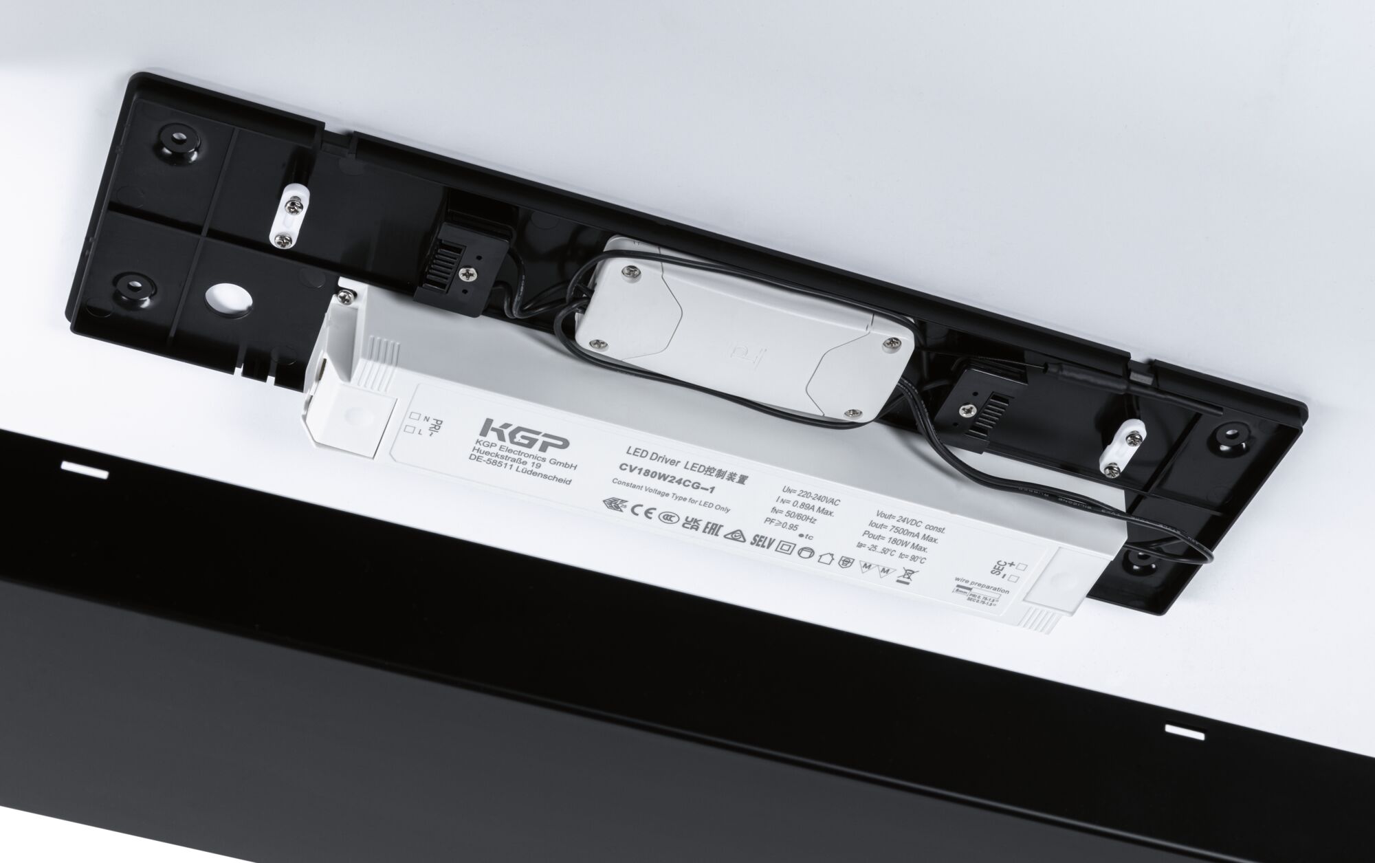 White LED driver CV180W24CG-1 with black mounting plate and cables for LED lighting systems