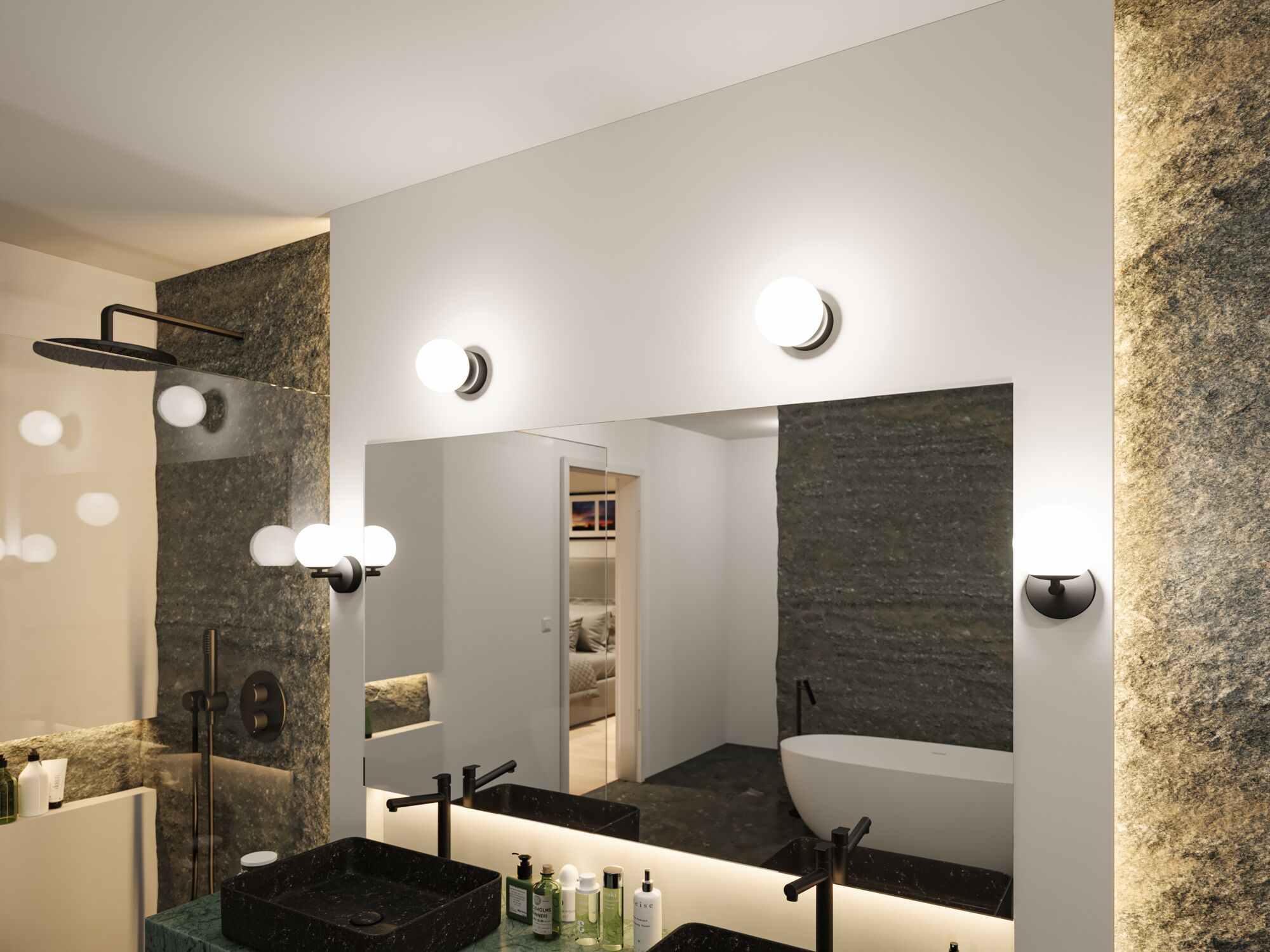 Moderne badkamer met zwarte armaturen, zwarte wastafel en ronde witte en zwarte wandlampen voor sfeerverlichting.