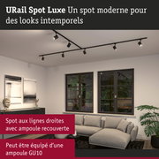 URail Spot Luxe lampe sur rail noire avec six spots dans un salon moderne avec canapé gris