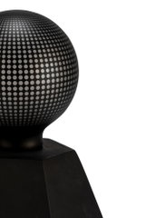 Black LED lamp with spherical metal shade featuring dot pattern for modern lighting design