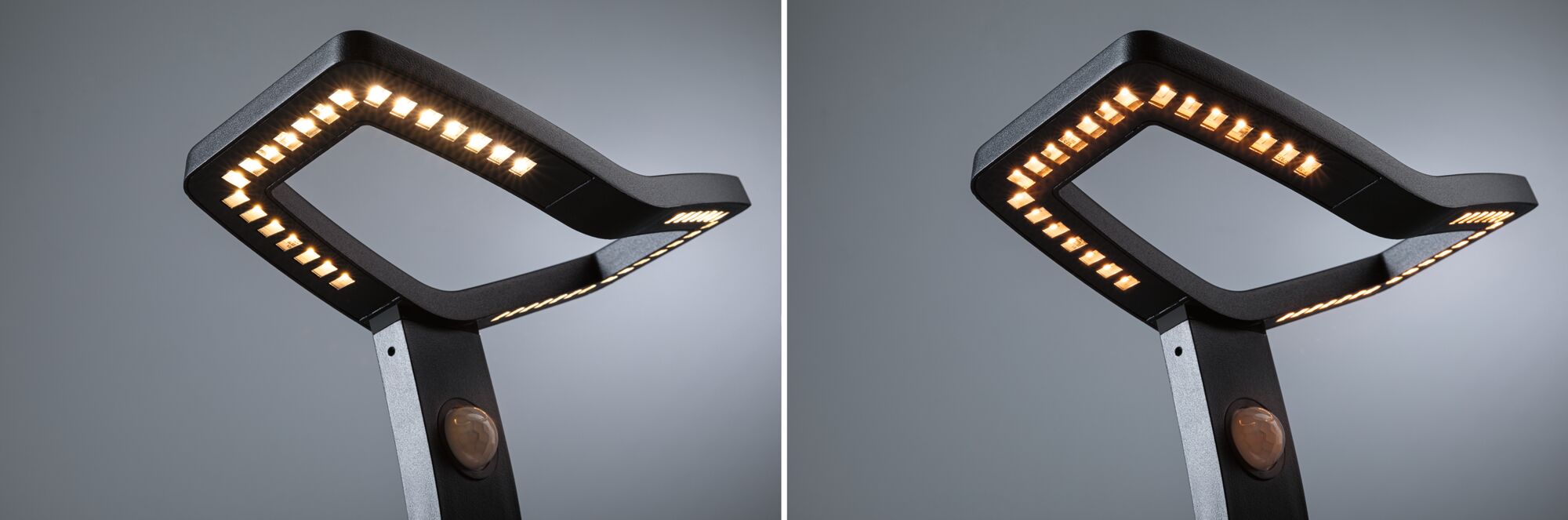 Zwarte LED-vloerlamp met modern rechthoekig ontwerp en ingebouwde bewegingssensor voor woonruimtes.