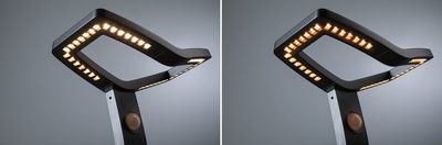 Zwarte LED-vloerlamp met modern rechthoekig ontwerp en ingebouwde bewegingssensor voor woonruimtes.
