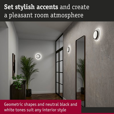 Modern hallway with geometric black and white LED wall lights creating stylish room lighting accents