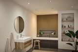 Modern bathroom with brown bathtub, wooden vanity, round mirror, and recessed LED ceiling lights