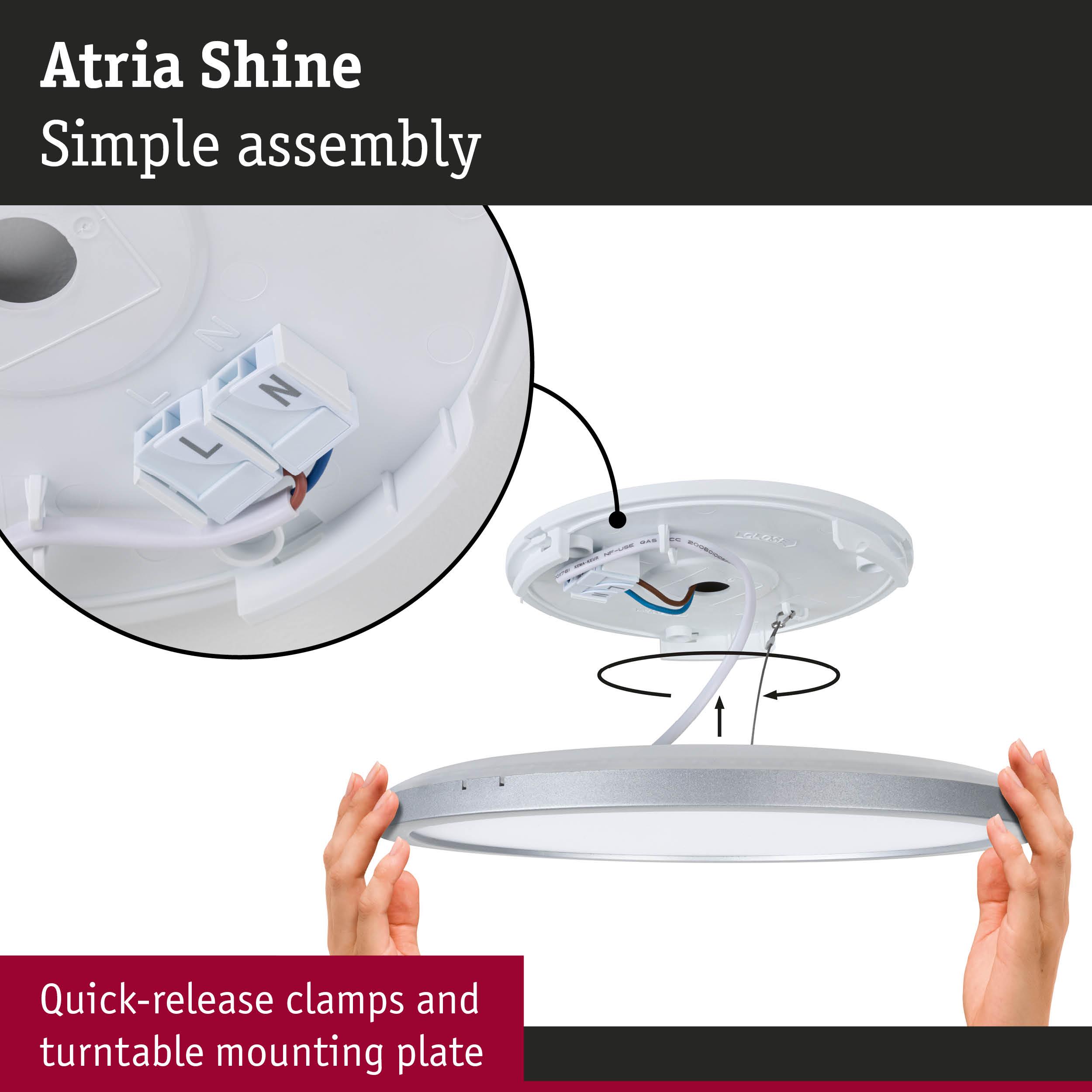Assembly of round Atria Shine LED ceiling light with quick-release clamps and turntable mounting plate in white.