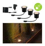Stainless steel LED ground lights with warm white glow and power cable for garden lighting