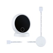 Round white LED control unit with black touch surface and white connector cable for lighting control