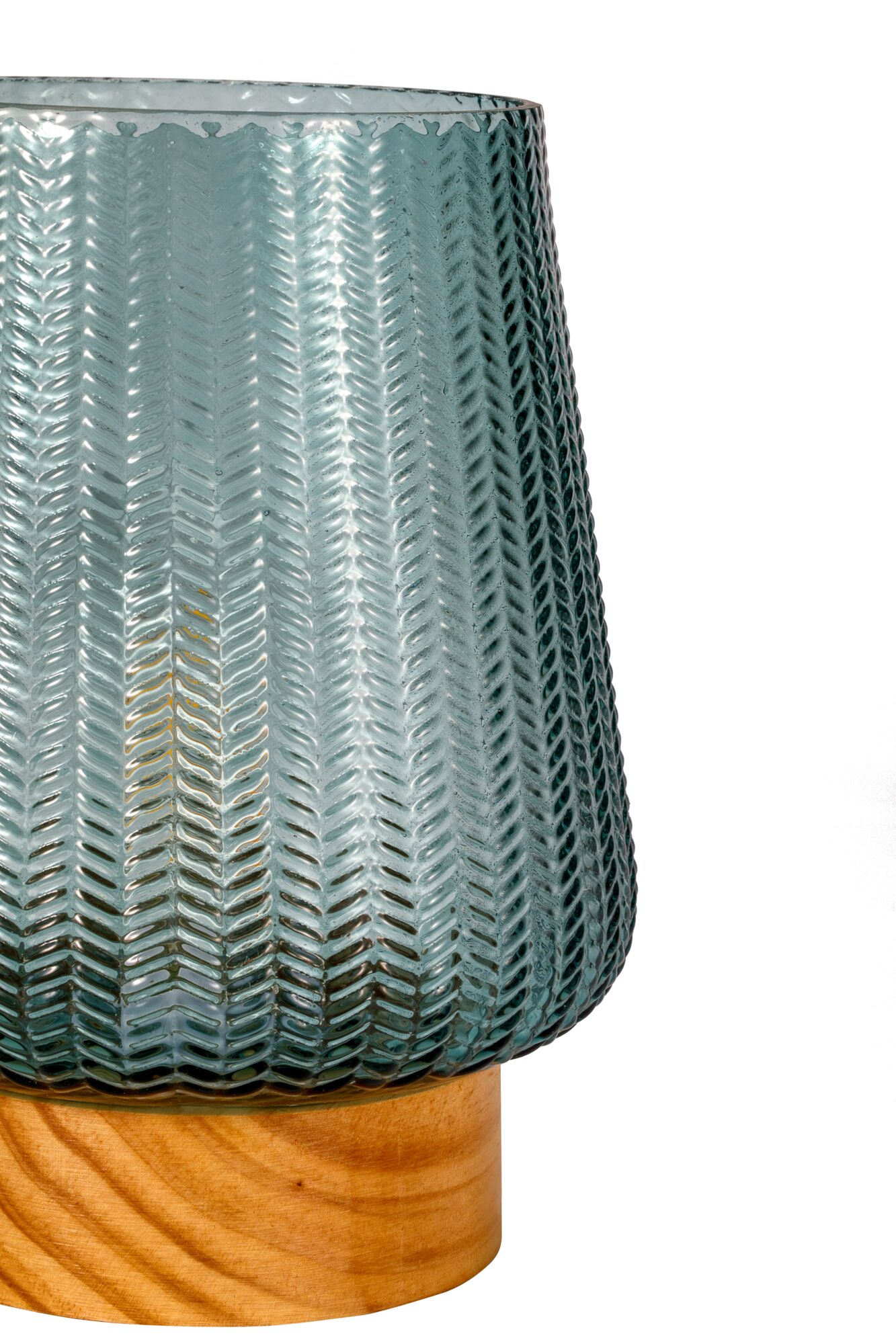 Blue-green glass lampshade with herringbone pattern on light wooden base for home lighting