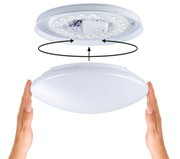 Assembly of round white LED ceiling light with diffuser and visible LED modules