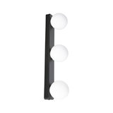 Modern wall light with three white glass globes and black metal frame for living spaces.