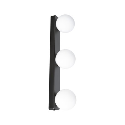 Modern wall light with three white glass globes and black metal frame for living spaces.