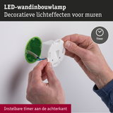 Witte LED-wandinbouwlamp met groene montagebox en instelbare timerfunctie