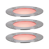 Three round LED recessed lights in brushed stainless steel with warm red light for outdoor use.